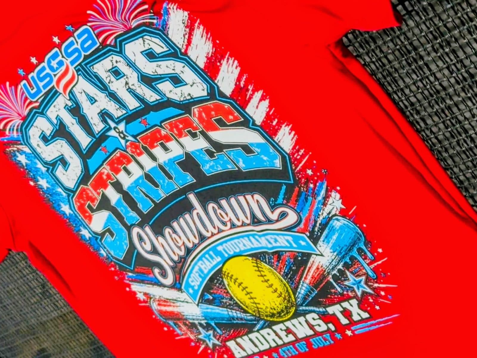 Bright red custom Stars and Stripes school softball tournament shirt